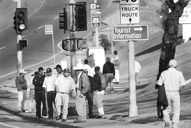Corner of I-5 off-ramp and Encinitas Boulevard. When it comes to patience, these guys are like monks compared to most Americans. - Image by Sandy Huffaker, Jr.