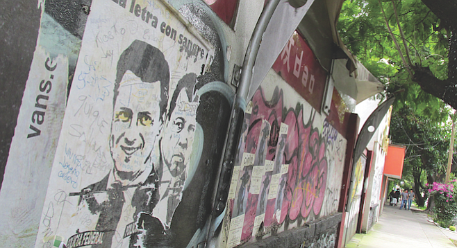 Graffiti art covers a wall in the pedestrian-friendly Coyoacán neighborhood.