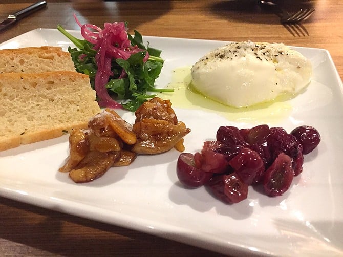 Burrata with sweet garlic and pickled grapes