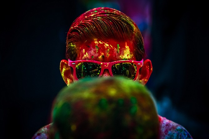 Boy of Color by Thomas Gartner of TAG 3 Photography

While at the festival of colors in Oceanside on May 14, 2016 I noticed a boy full of color with sunglasses on and when I took the photograph some one had walked right in between me and the boy. It wasn't till I got home that I noticed that this photograph was absolutely perfect. 