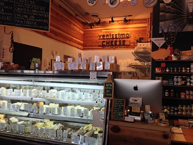 If you can look past the beer, you’ll spot a Venissimo Cheese counter in the back of Bottlecraft North Park.
