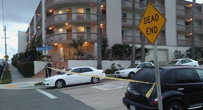 Crime scene tape across Santa Cruz Avenue at Bacon Street