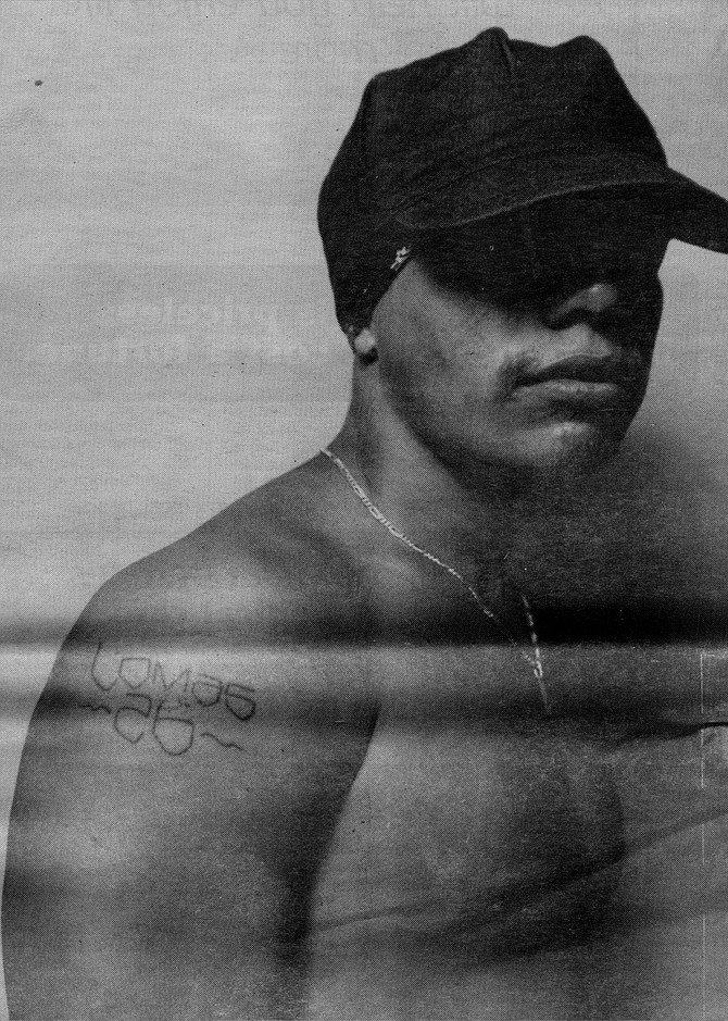 Lomas homeboy, wearing Campo hat - status symbol among gang members. - Image by Robert Burroughs