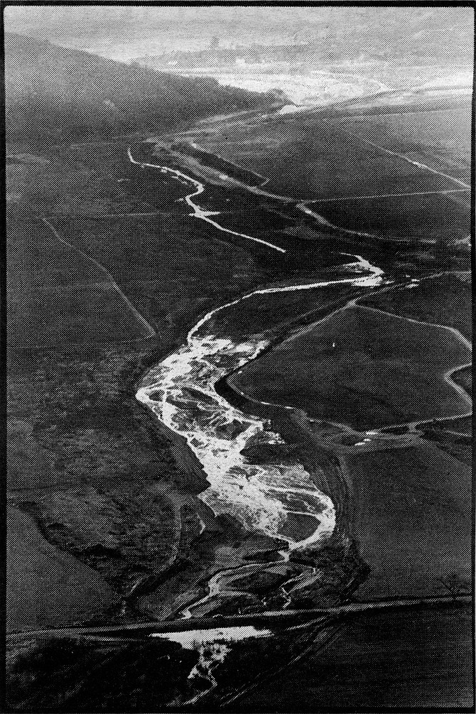The San Pasqual Valley.  In those days the river’s course was serpentine, which the dairyman H.G. Fenton thought deprived him of usable farm land. So Fenton “corrected” the problem by using bulldozers to straighten three miles of the river. 