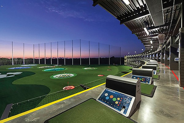 TopGolf, millennials’ sort of golf game — accompanied by loud rock and booze