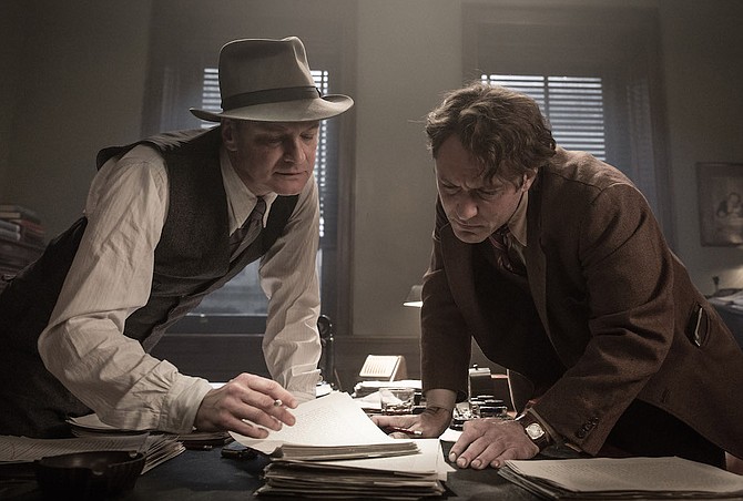 Maxwell Perkins (Colin Firth) and Thomas Wolfe (Jude Law)