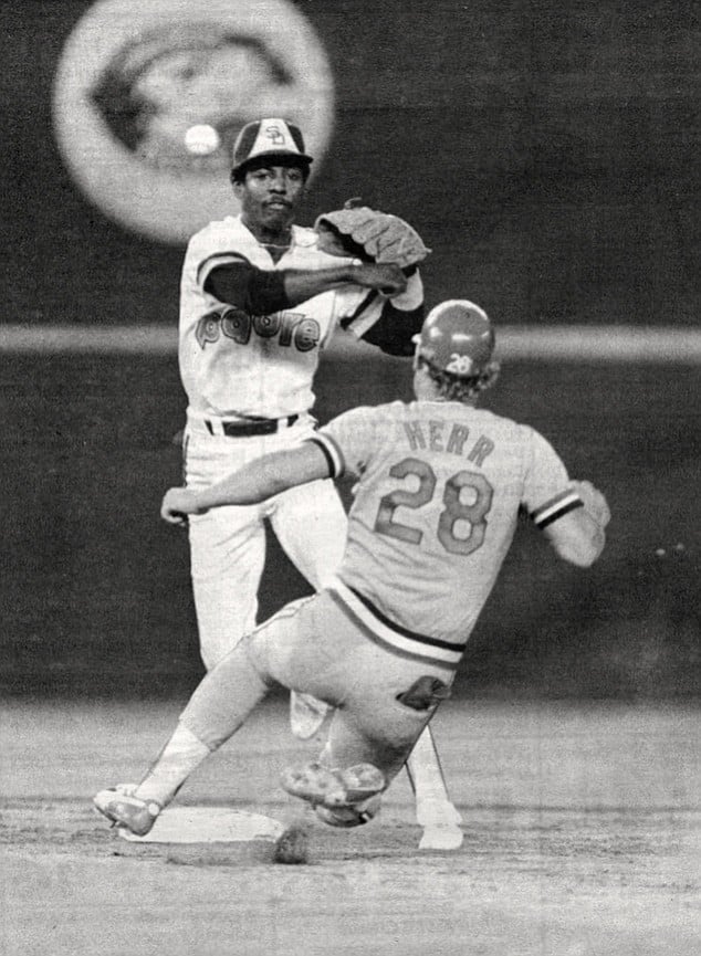 Alan Wiggins turns a double play against the St. Louis Cardinals during the 1984 championship season