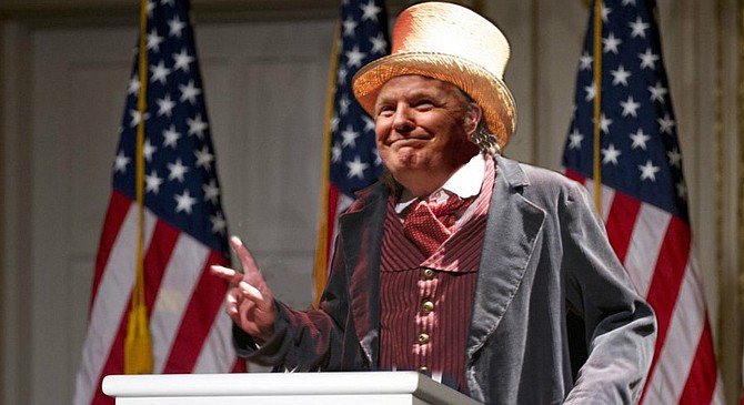 Trump addresses members of the press dressed as the Dauphin from Huckleberry Finn. “Was Twain’s Dauphin really the heir to the throne of France? Who cares? What matters is that he was a great American: someone with the courage to write his own narrative and make his own history. Someone with the guts to take risks to get what he wanted. Americans don’t want honesty from their leaders; I think the past 100 years have made that pretty clear. What they want is results, and a good story to go along with them. And that’s what I can provide, just like what the Dauphin provided Huck.” When a reporter pointed out that the Dauphin was eventually tarred and feathered for his swindles, Trump replied that it was probably the work of religious extremists “who have no place in this great nation, then or now.”