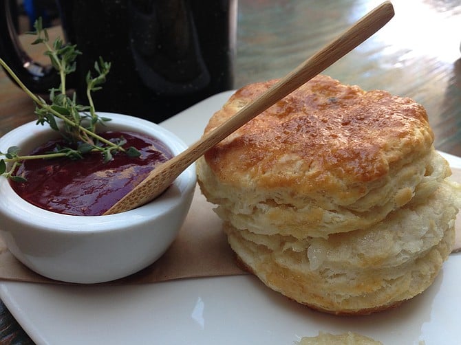A terrific biscuit and tasty jam, served with an adorable small wooden spoon