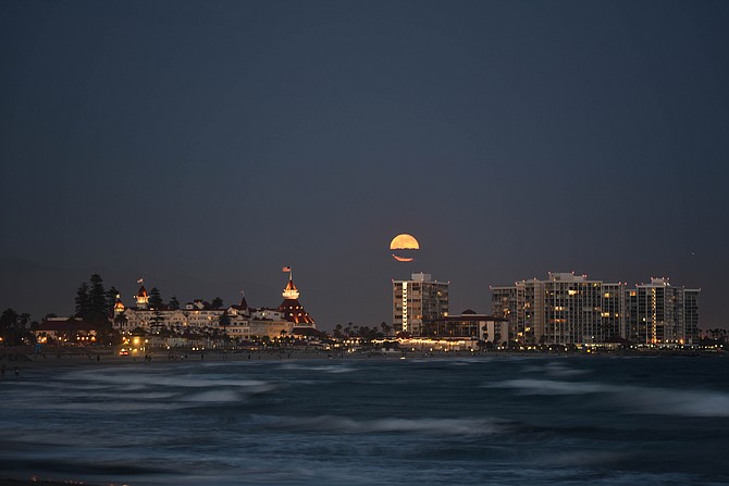 A once in a generation "Strawberry Moon" and Summer Solstice over the Coronado landmark Hotel Del and Shores!
