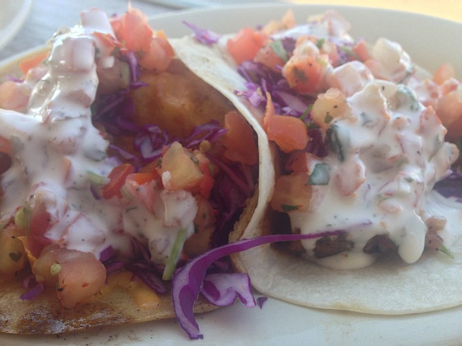 South Beach fish tacos are mostly the same as they’ve ever been, maybe a little milder. Corn tortillas by request.
