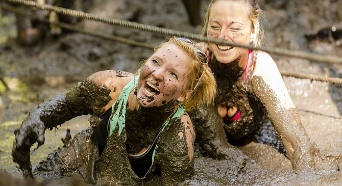 Participants get down ’n dirty at the 2016 Marine Corps World Famous Camp Pendleton Mud(?) Run