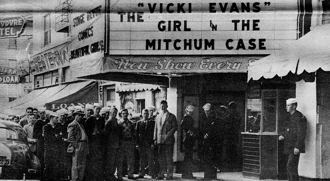 The picture taken in 1945 shows the Hollywood Theater. The marquee proclaims: “Vicki Evans The Girl in The Mitchum Case." Robert Mitchum, Johnston explains, had just been caught with drugs.