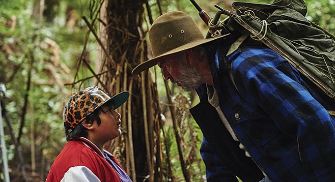 Hunt for the Wilderpeople: Sam Neill tries to be gruff but cannot hide his admiration for Julian Dennison’s hat.