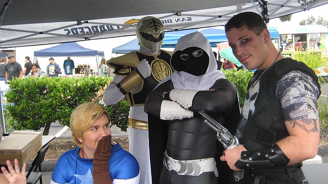 Captain America, Mighty Morphin Power Rangers cosplayer, Moon Knight 
and Cos-Losseum founder Dan Posey as Punisher