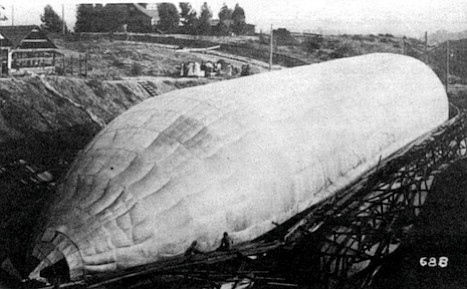 Toliver's work force built a hangar over the Golden Hill canyon and dammed the canyon at C Street so the gasbag could be inflated submerged in water 