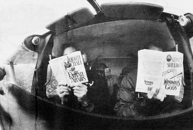 Pilots and passengers reading - Image by Robert Burroughs