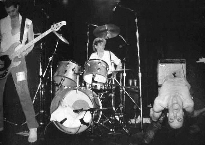 Michael Page (far left), Iggy Pop (far right). Iggy Pop: “I met Michael when he was mowing lawns in La Jolla....  He was a workaholic and I just hired him."