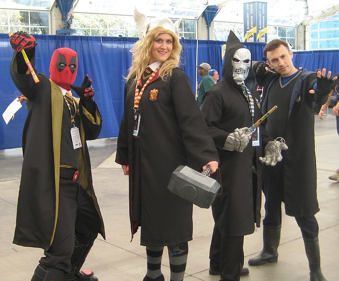 Deadpool, Thor, Doctor Doom and other cosplayer at Comic-Con