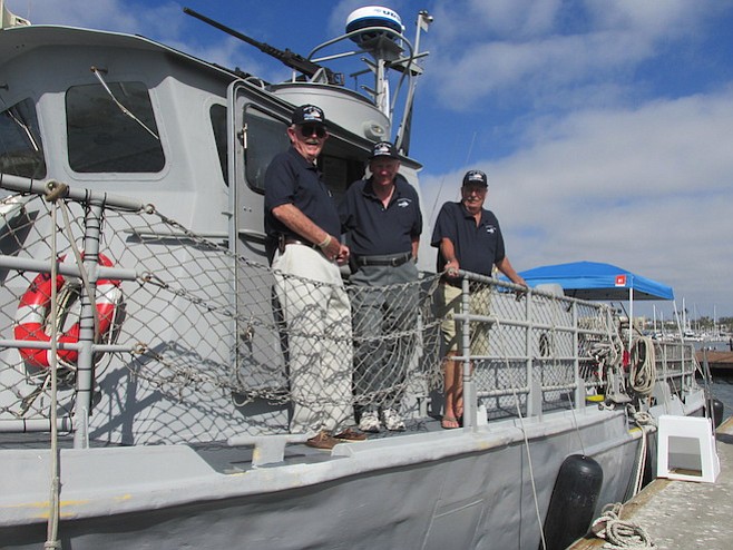 Swift Boat sailors Dave Bradley, Bob Bolger, and John Paul Jones aboard the restored vessel