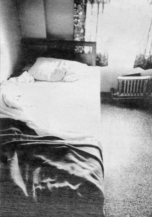 The sheets were a hard white color, covered by a dark, warm, rough cotton blanket and a heavy bedspread. The pillow never lost its full shape.