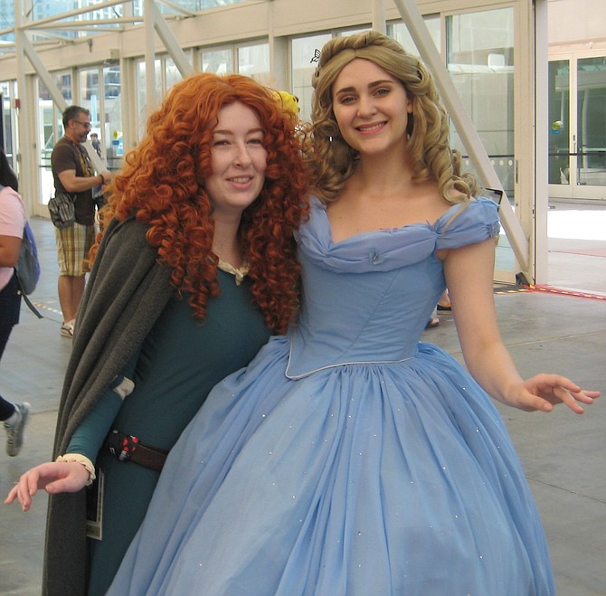 Cinderella posing with other cosplayer