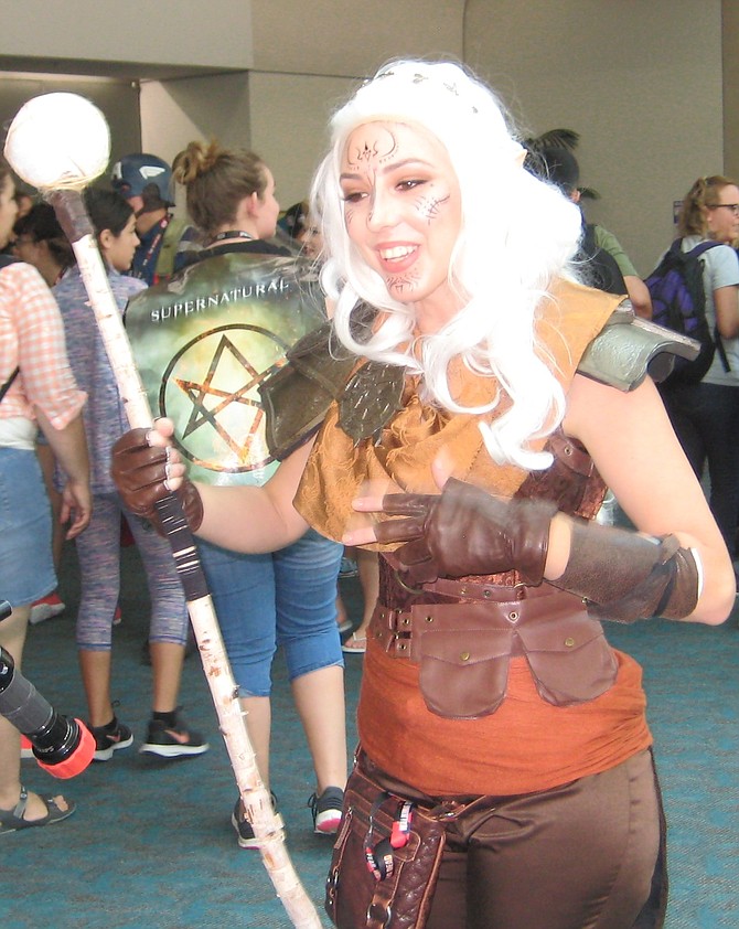 cosplayer in front of Comic-Con Exhibit Hall 