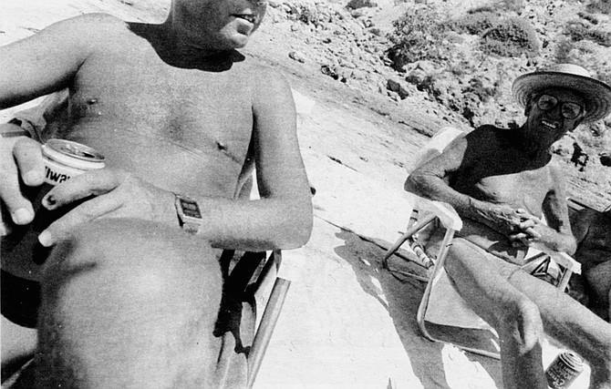 Two men enjoying the sun at Black's Beach