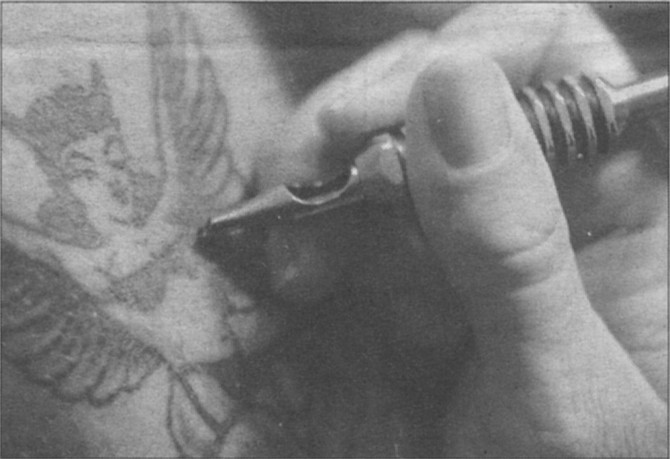 A tattoo being drawn