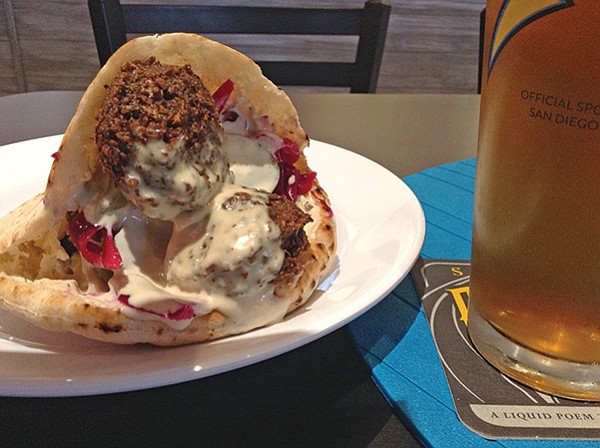 Falafel and beer go together like a horse and carriage.