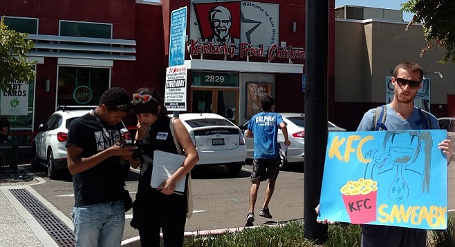 Antibiotic overuse activists outside KFC in North Park