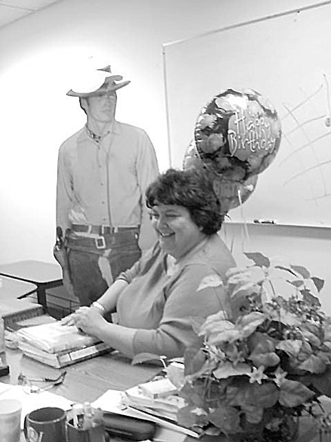 Ms. Solovay with balloons and Clint Eastwood cutout
