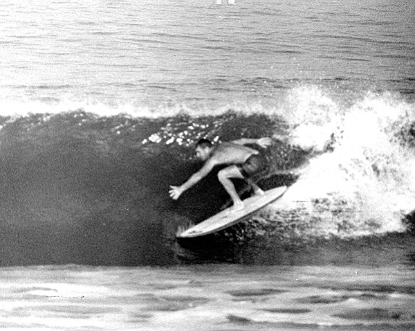 Mouse Robb surfing Ocean Beach Pier on a shortboard in 1964