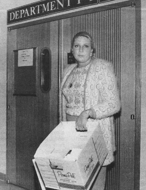 Betty with court papers