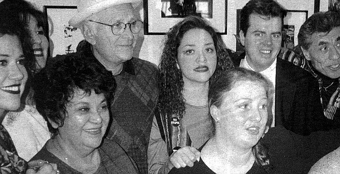 Lear (in glasses) poses with cast members; to his left are playwright Josefina Lopez, John Mercedes, and Virchis