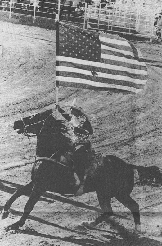 Rider brining in the flag