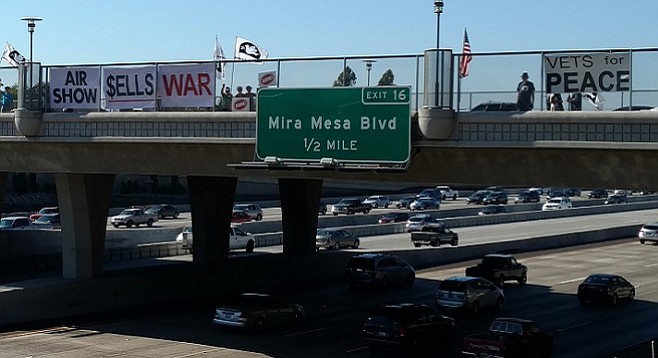 Anti-air show banners hung along I-15 northbound on Thursday, August 18