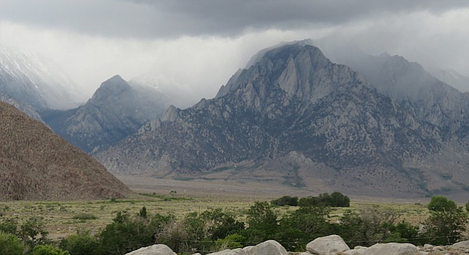A storm rolls in over the neighboring Sierra Nevadas.
