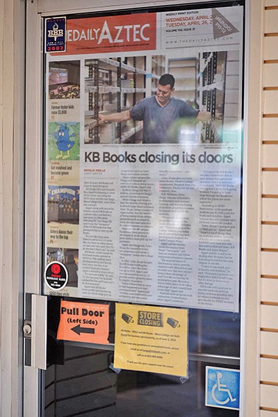 Daily Aztec article on the door of KB Books