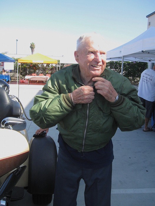 Retired Navy captain Royce Williams arrived by motorcycle.
