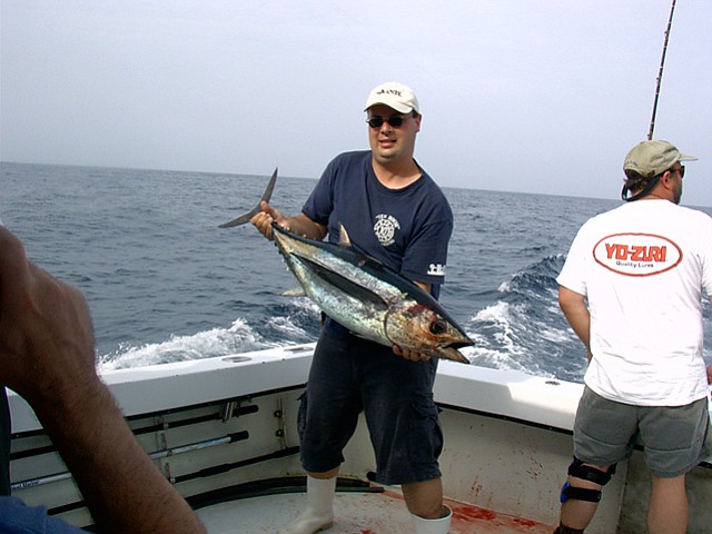 Fisherman with albacore tuna