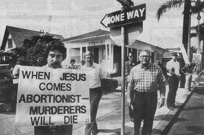 Reverend Owens and other Fellowship members picketing Womancare in September, 1984