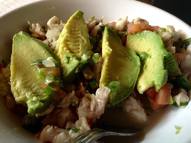 Ceviche, with avocado toppings