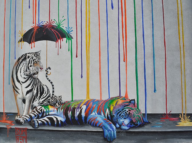 Michael Summers' 2013 mural Catnap — on the wall outside Witch Creek Winery — is the inspiration for the name Sleeping Tiger Coffee.