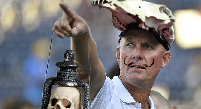 In a clear homage to 20th-century surrealist Salvador Dali, Coach McCoy sported an upturned mustache and a hat fashioned from the skull of a horse for September 11th’s season opener against the Kansas City Chiefs. The kitschy skull lamp may have been a reference to Shakespeare’s play Macbeth, which contains the lines, “All our yesterdays have lighted fools the way to dusty death…[Life] is a tale told by an idiot, full of sound and fury, signifying nothing.”

McCoy, however, refused to comment on this, and also on the question of whether or not he thought professional football could be substituted for “life” in this case. “I’m not about to force my own interpretation of my work on the viewing public,” he explained. “All I can do is invite people to consider what it means to them. What all of this means, or doesn’t mean, or whether the very search for meaning is as absurd as my coaching strategy."
