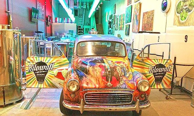 Kilowatt Brewing's hand painted psychedelic 1961 Morris Minor car won't be out of place parked in OB.