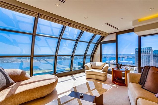 Curved glass walls “seem to grasp the sky,” 