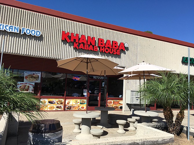 A strip mall storefront restaurant serving Indian and Pakistani food.