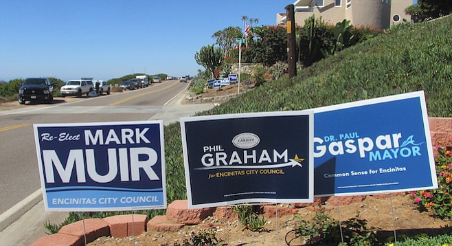 in an uncommon show of political alignment, almost every home has yard signs posted for the slate of three candidates.