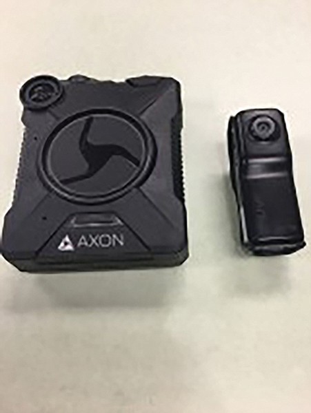 Which police departments were first to issue body-worn cameras to officers?